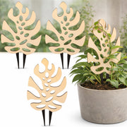 Junkin front view of monstera leaf trellis shows decorative support