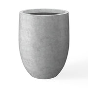Kante front view pale gray planter showing modern silhouette and visual weight reduction