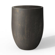 Kante front view of planter showing smooth concrete finish and stable base for style