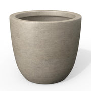 Kante front view of weathered concrete planter showing charcoal finish and modern shape, durable accent