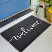 KILOCOCO front view welcome mat showing black embossed welcome and clean benefit
