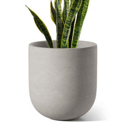LE TAUCI front view showing neutral gray finish and balanced form for stylish display