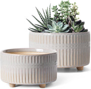 LE TAUCI front view of both planters showing neutral star white glaze and shapes