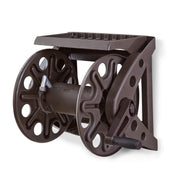 Liberty Garden reel front view showing bronze finish and shelf for tidy storage