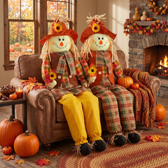 Libima scarecrow beside a chair showing life-size 60-inch scale