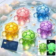 LIFCIUSO front view of five jumbo resin turtles showing colorful daytime finish and size