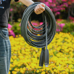 LINEX hose spraying lawn showing steady flow for garden and RV cleaning