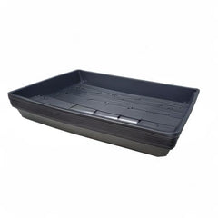 Living Whole Foods trays in use with microgreens and hydro pads on a countertop, space-saving and reusable