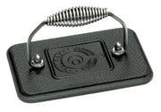 Lodge grill press front view showing rectangular face and hammered finish for even pressing