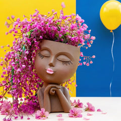 LovTocTic face planter front view showing sculpted features and decorative benefit