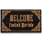 MAINEVENT doormat front view showing Haunted Mansion greeting, welcoming guests