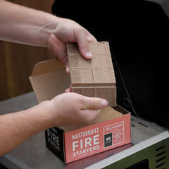Masterbuilt cubes in hand to show size and easy handling