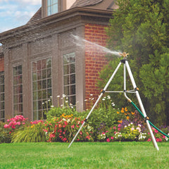 Melnor pulsating head closeup showing durable metal construction and precise spray