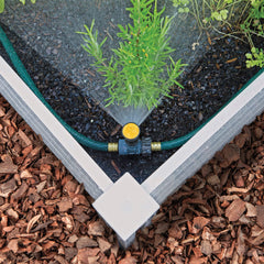 Melnor sprinkler head close-up showing adjustment dial for precision