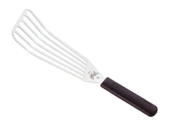 Mercer Culinary Hell's Handle in use flipping fish on a hot grill for confident high-heat control