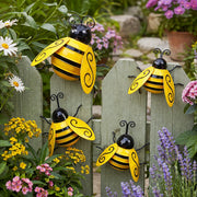 Miyolo front view of four painted metal bees showing bright outdoor charm