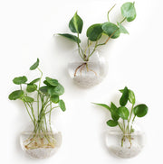 Mkono front view of three oblate hanging planters showing sleek design and visibility