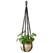 Mkono front view of black macrame hanger showing full design and balance