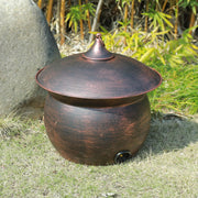 MNRYLKB front view of copper hose pot showing elegant storage benefit