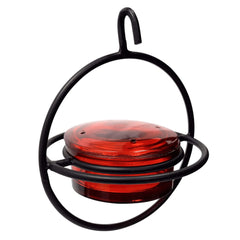 Monarch Abode front view showing red bowl and black metal frame attracts hummingbirds