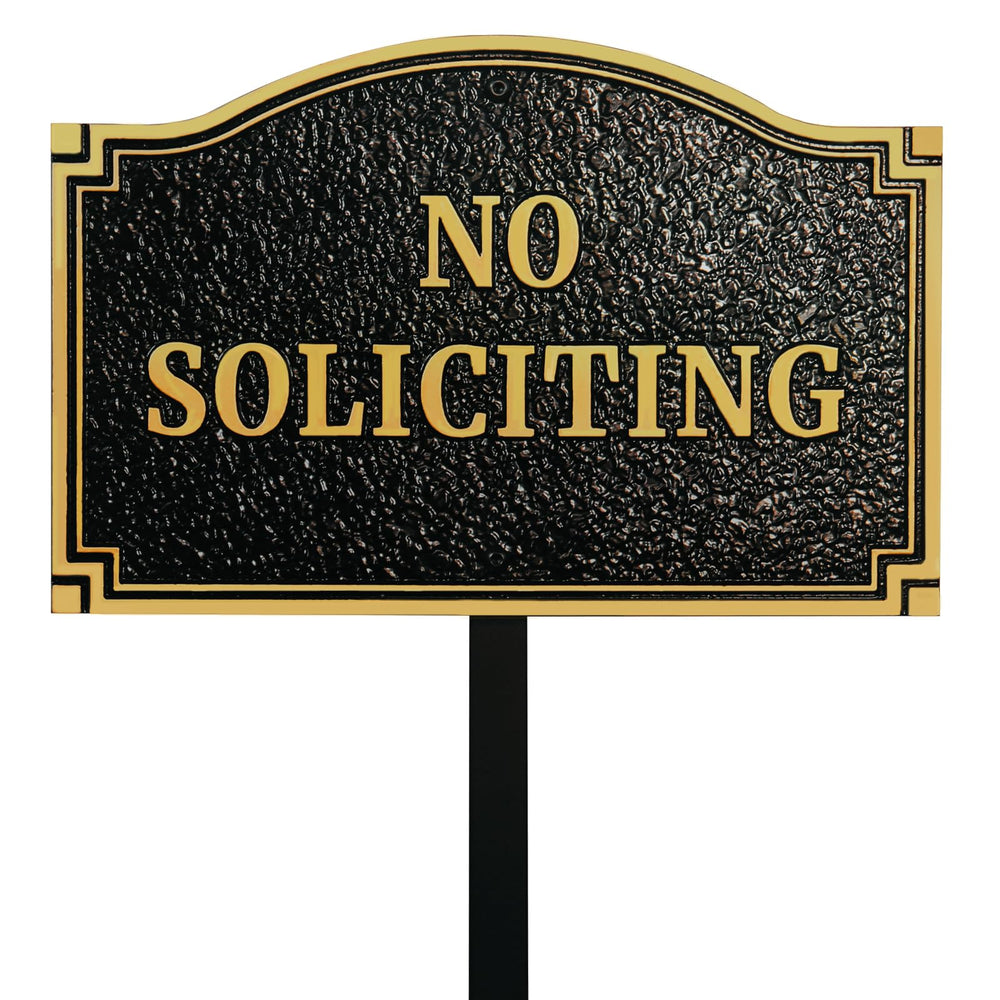 Morgtta front face plaque showing bold no soliciting message and elegant finish