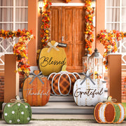 Moucuny front view of six pumpkin signs showing cohesive porch curb appeal