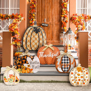 Moucuny front view of six pumpkin porch signs showing cohesive autumn style and curb appeal