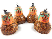 Mr. Bird front packaging showing four spicy seed bells and included hanger for quick setup