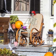 MyoGrip skeleton posed on steps to create welcoming spooky porch scene