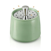 Mysora ceramic trap front view showing compact design and discreet pest control