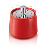 Mysora ceramic trap front view showing elegant red finish and compact shape benefit: decor-friendly containment