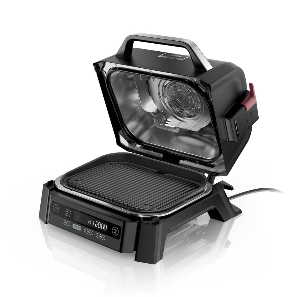 Ninja woodfire front view showing compact outdoor grill and smoker, ideal for patios