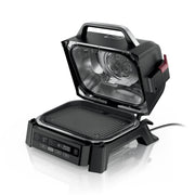 Ninja woodfire front view showing compact outdoor grill and smoker, ideal for patios