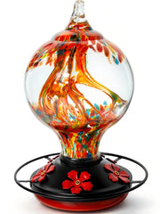 Novoto front view of feeder showing bright glass and ports, attracts hummingbirds
