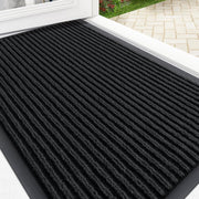 OLANLY front view mat by a doorway showing modern stripes and neat containment
