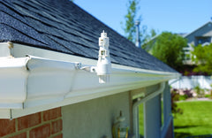 Orbit sensor mounted under eave with weather-resistant wire to controller, prevents freezing and overspray