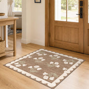 Othilic front view tan floral rug showing vintage scalloped design and welcoming appeal