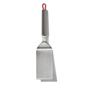 OXO front view of camp griddle turner showing stainless head and handle, durable cooking