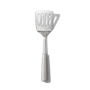 OXO cooking turner front view showing stainless steel and sleek design for durability