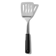 OXO Good Grips turner front view showing polished stainless head and grip for durable use