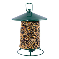 Pine Tree Farms seed log placed in classic feeder for easy bird perching