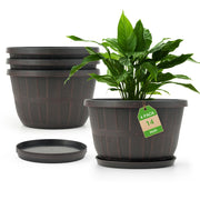 Quarut front view of four 14-inch barrel planters showing finish and shape, durable styling