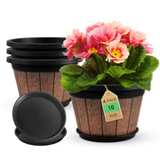 Quarut front view of four whiskey barrel planters showing rustic style and cohesion