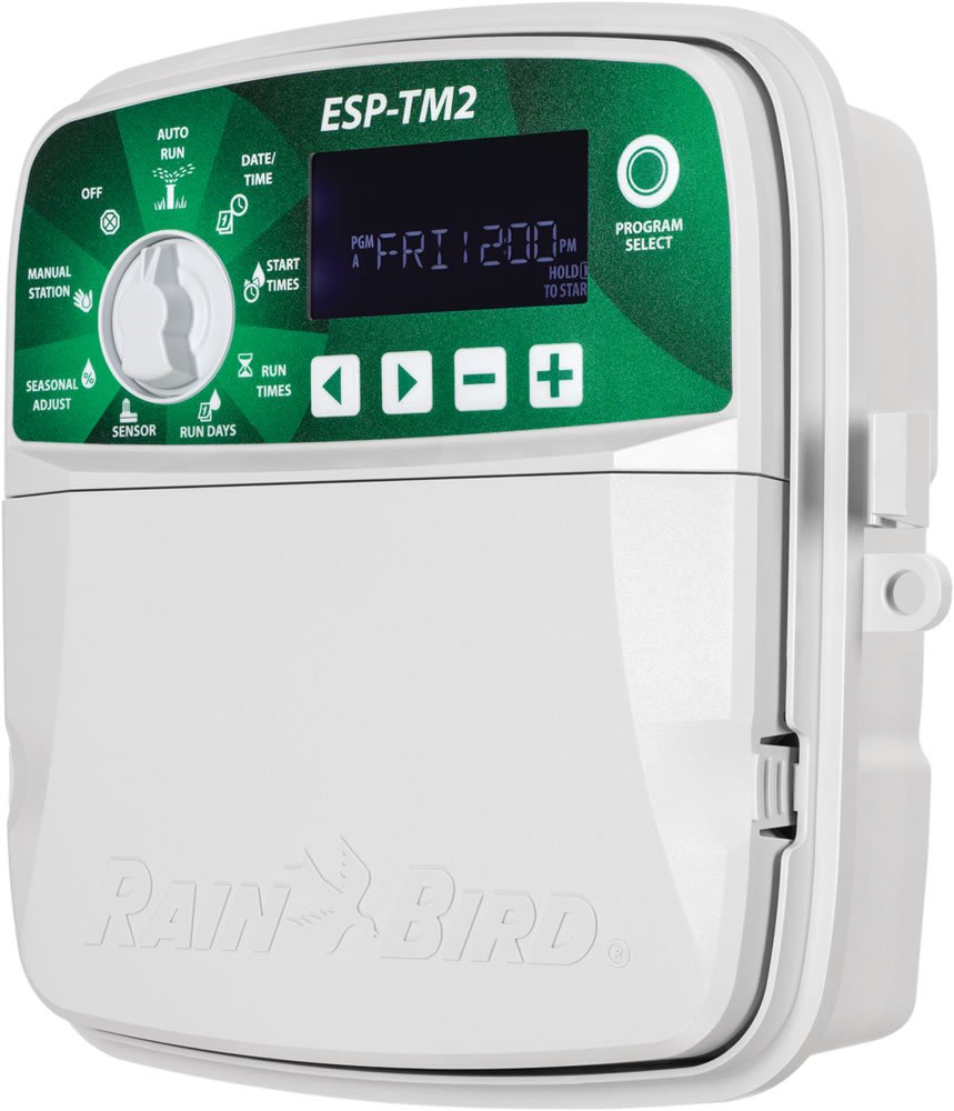 Rain Bird TM2-6 front panel showing dial and buttons for quick programming and ease