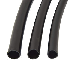 Raindrip tubing with a punched emitter installed delivering precise plant watering