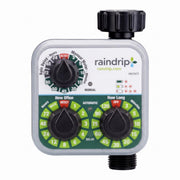 Raindrip timer front view showing dials and indicator light for easy scheduling