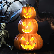 Retisee front view of stacked pumpkins showing warm LED glow