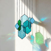 Rswardeleco front view of blue-green suncatcher showcasing full design and charm