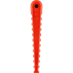 RYOBI serrated blade close-up highlighting tooth profile for improved grip on thick grass