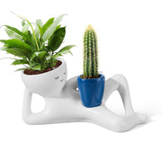 Sederikun front view of blue smiling planter showing playful design and charm
